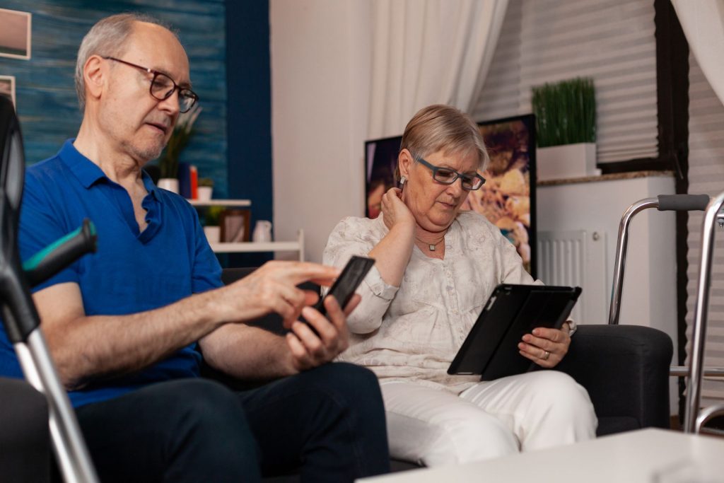 old married people using digital devices and sitti 29eb26x.jpg